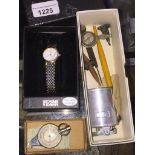 Box with lighter and a Marks and Spencer watch Catalogue only, live bidding available via our