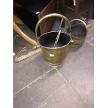 Two bras coal buckets and a brass fender Catalogue only, live bidding available via our website,