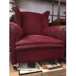 A wing back armchair with re upholstery Catalogue only, live bidding available via our website, if
