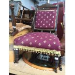 An Edwardian nursing chair with fleur de lys upholstery Catalogue only, live bidding available via