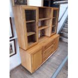 An Ercol blonde elm sideboard with cabinet top. Catalogue only, live bidding available via our