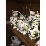 Nine pieces of modern Masons green pottery Catalogue only, live bidding available via our website,