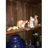 Four Russian porcelain animals Catalogue only, live bidding available via our website, if you