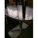 A cafe style round table Catalogue only, live bidding available via our website, if you require P&