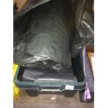 A box with quantity of outdoor furniture covers. Catalogue only, live bidding available via our