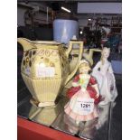 Two pottery teapots and two small Royal Doulton figures Catalogue only, live bidding available via