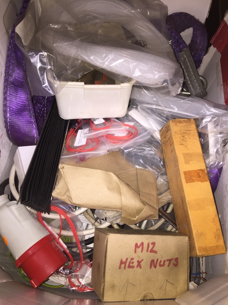 A box of misc items to include reamers, electrical items, electrical testing lights, cable, hex