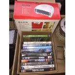 A box of CDs and a fan heater Catalogue only, live bidding available via our website, if you require