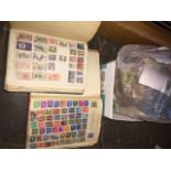 Two stamp albums and a box of loose stamps Catalogue only, live bidding available via our website,