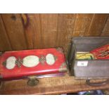 An Oriental padded jewellery box and a small metal tin trunk containing old small tins with