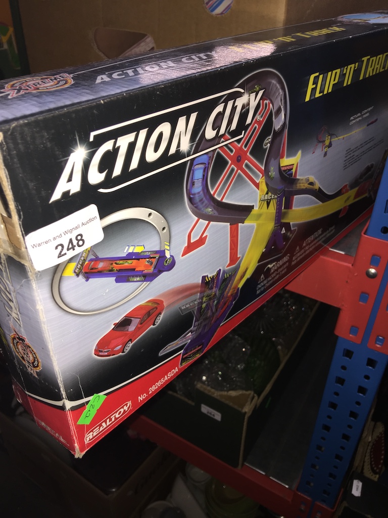 A boxed Action City game Catalogue only, live bidding available via our website, if you require P&