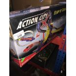 A boxed Action City game Catalogue only, live bidding available via our website, if you require P&
