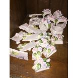 Various porcelain place markers and serviette rings Catalogue only, live bidding available via our