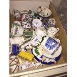 Small box of porcelain trinket boxes etc. Catalogue only, live bidding available via our website, if