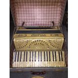 A Pietro accordion in hard case. Catalogue only, live bidding available via our website, if you