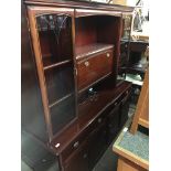 A mahogany lounge unit Catalogue only, live bidding available via our website, if you require P&P