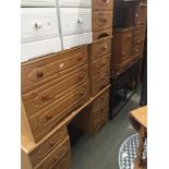 Pine effect bedroom suite comprising a dressing table, chest of drawers and pair of bedside chests
