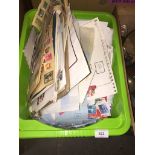 Green tub of stamps on letters etc. Please note, lots 1-1000 are not available for live bidding on