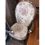 An Ercol spindle back armchair. Please note, lots 1-1000 are not available for live bidding on the-
