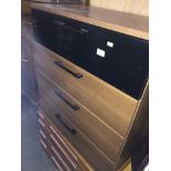 A modern chest of drawers - Next modern clock in drawer Please note, lots 1-1000 are not available