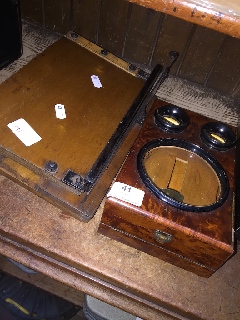 A mini magnifier and a small guillotine Please note, lots 1-1000 are not available for live