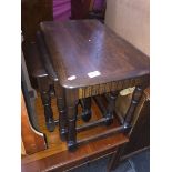 An oak nest of tables Please note, lots 1-1000 are not available for live bidding on the-saleroom.