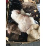 A box of fur tails, collars, etc Please note, lots 1-1000 are not available for live bidding on