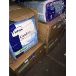 4 boxes of Tena pads. Please note, lots 1-1000 are not available for live bidding on the-saleroom.