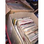 A box of 1960s vinyl singles collection and a box of old records. Please note, lots 1-1000 are not