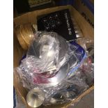 A box of misc kitchenware. Please note, lots 1-1000 are not available for live bidding on the-