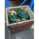 A tea chest of garden hose Please note, lots 1-1000 are not available for live bidding on the-