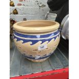 A pottery planter. Please note, lots 1-1000 are not available for live bidding on the-saleroom.