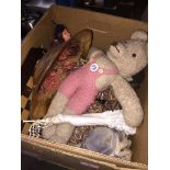 A box of misc items to include soft toys, dolls, chess set, etc. Please note, lots 1-1000 are not