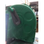 A Hozelock garden hose reel with hose. Please note, lots 1-1000 are not available for live bidding