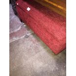 A modern red cloth ottoman Please note, lots 1-1000 are not available for live bidding on the-