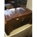 A camphor wood chest/bedding box with eastern style carved top Please note, lots 1-1000 are not