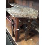 A hexagonal eastern carved table Please note, lots 1-1000 are not available for live bidding on