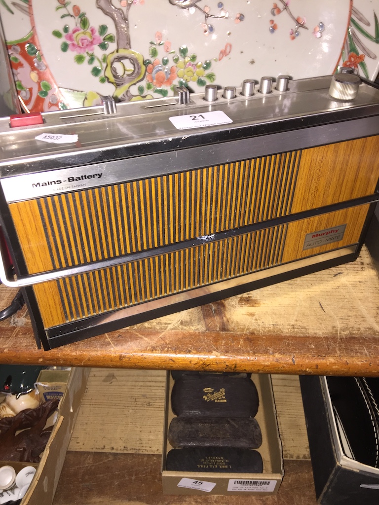 A Murphy Auto Mate radio, model no : MV5702 Please note, lots 1-1000 are not available for live