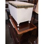 A coffee table and a white woven Lloyd Loom style bedding/linen box Please note, lots 1-1000 are not