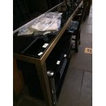 An Italian metal and smoke glass top console table Please note, lots 1-1000 are not available for