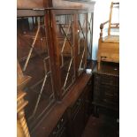 A reproduction mahogany breakfront cabinet bookcase with secretaire drawer Please note, lots 1-