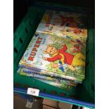 A plastic crate of Rupert Annuals Please note, lots 1-1000 are not available for live bidding on