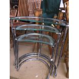 Chrome and glass nest of tables Please note, lots 1-1000 are not available for live bidding on the-