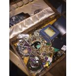 A vanity case with quantity of costume jewellery Please note, lots 1-1000 are not available for live