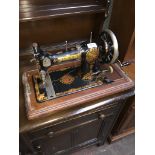 A vintage cased Jones hand cranked sewing machine Please note, lots 1-1000 are not available for