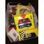 A box of model cars and others. Please note, lots 1-1000 are not available for live bidding on the-