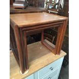 A teak G-Plan nest of tables Please note, lots 1-1000 are not available for live bidding on the-