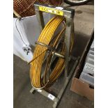 A cable feeder on metal stand Please note, lots 1-1000 are not available for live bidding on the-