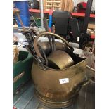 A brass coal scuttle, fire irons and 2 brass pans. Please note, lots 1-1000 are not available for