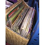 A wicker magazine rack with craft magazines. Please note, lots 1-1000 are not available for live